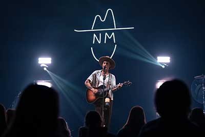 Singer performing at Homecoming show.