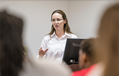 Professor teaching in front of class