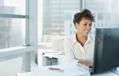 Woman working at computer.