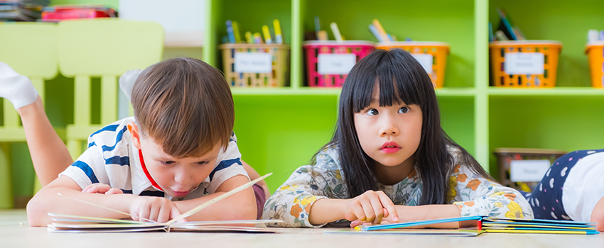 Children studying books.