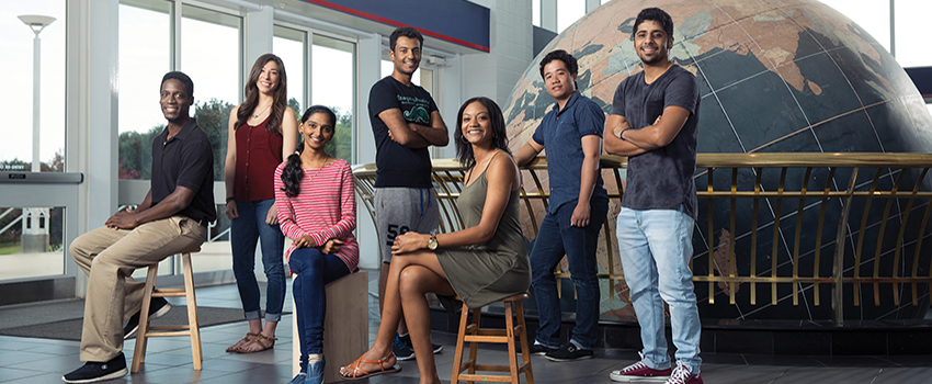 International students in front of Waterman Globe