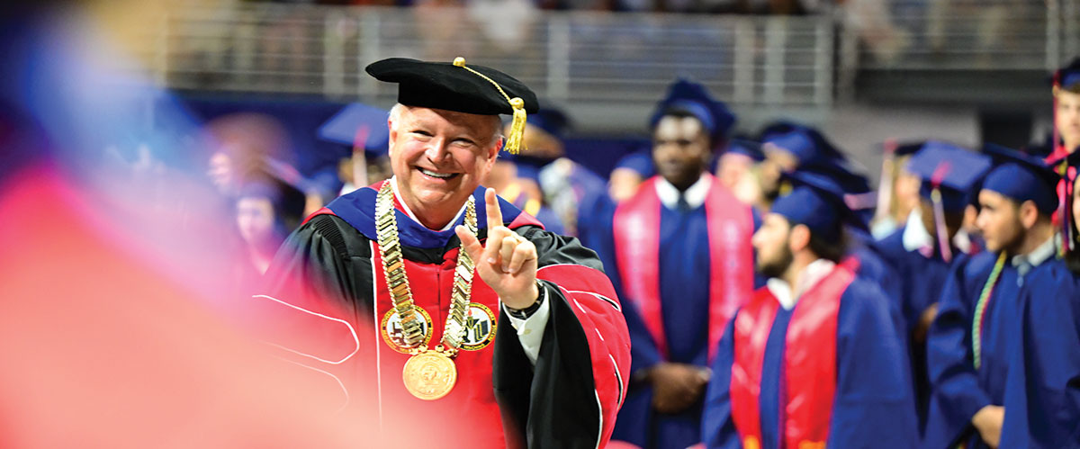 PRESIDENT JO BONNER enters the USA Mitchell Center arena for Spring Commencement. data-lightbox='featured'