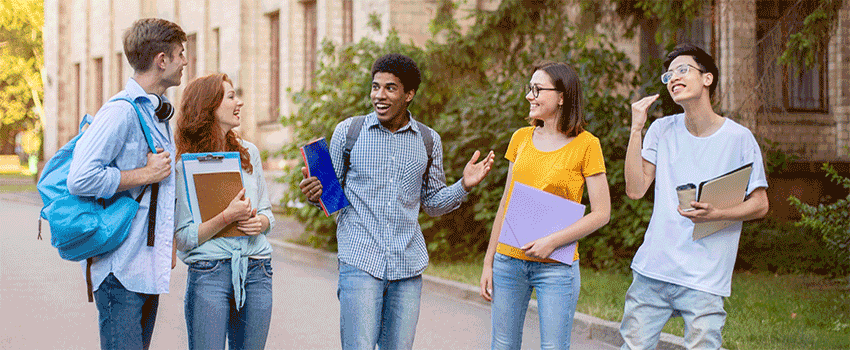 Group of students talking outside.