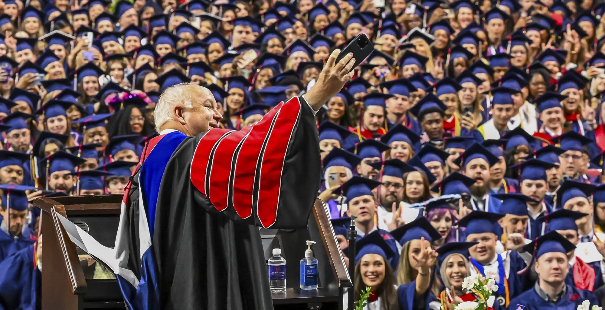 Before the degrees were conferred, President Jo Bonner called for &ldquo;a Kodak moment.&rdquo; He asked everyone to pull out their phones for what he called "the biggest group selfie that has ever been made on the University of South Alabama campus.&rdquo;  Photo of him taking a selfie. 
