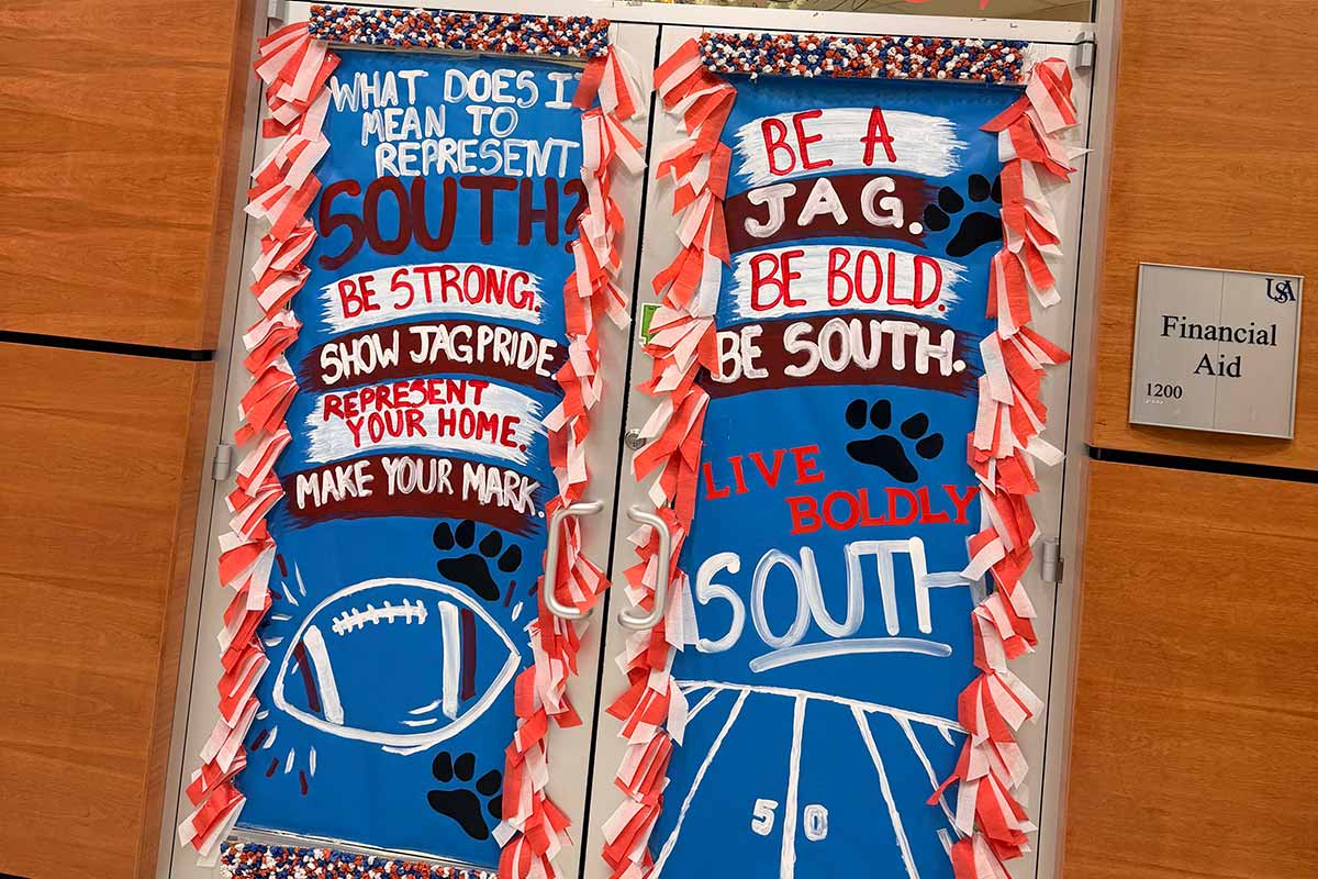 Financial Aid doors decorated for homecoming with what represents South. Financial Aid doors decorated for homecoming with what represents South.